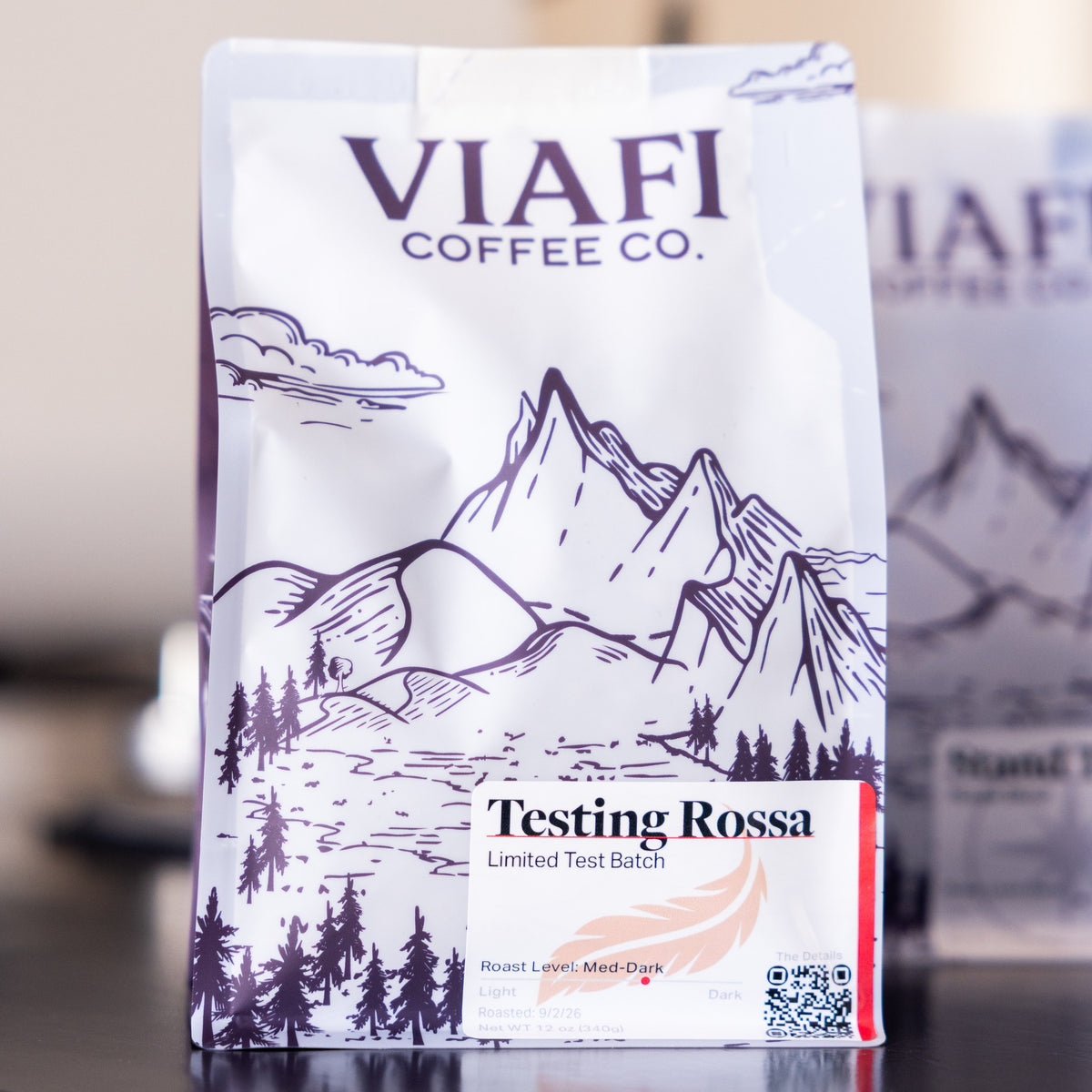 A 12 oz bag of Viafi Testing Rossa on the roastery counter